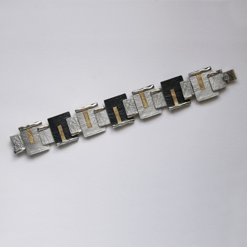 1752 - SILVER & GOLD BRACELET.  B1752